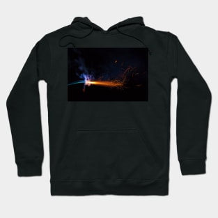 Burning fuse with sparks and blue smoke isolated on black background Hoodie